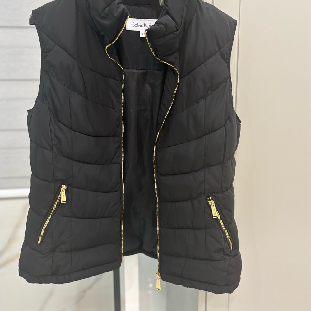 Calvin Klein Women's Black Puffer Vest with Gold Accents